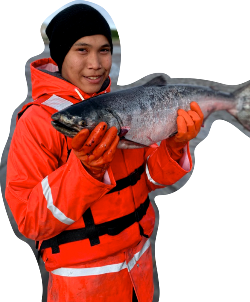 Boy holding a large salmon